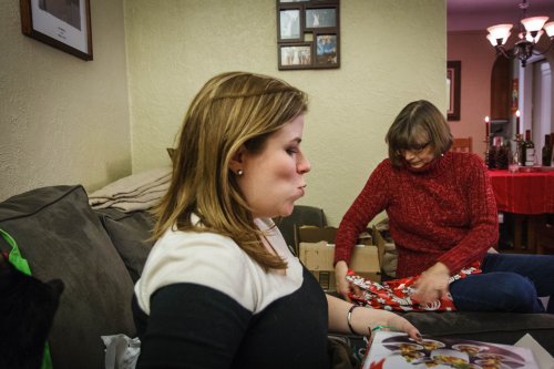 Julia Miller opening a present